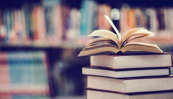 Book in library with open textbook,education learning concept